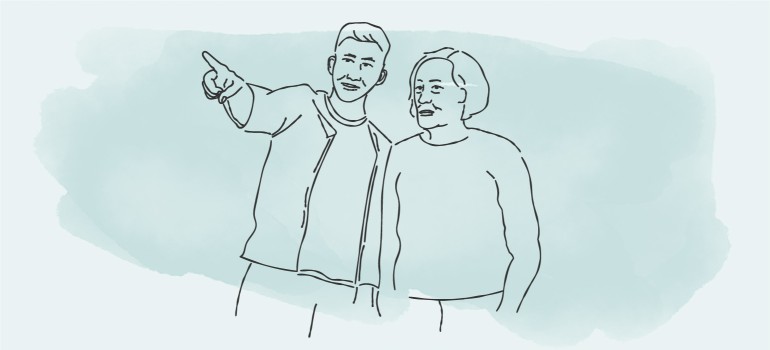 Mann zeigt Frau den Weg